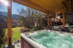 Soak your body in the hot tub and your soul in the surrounding nature.